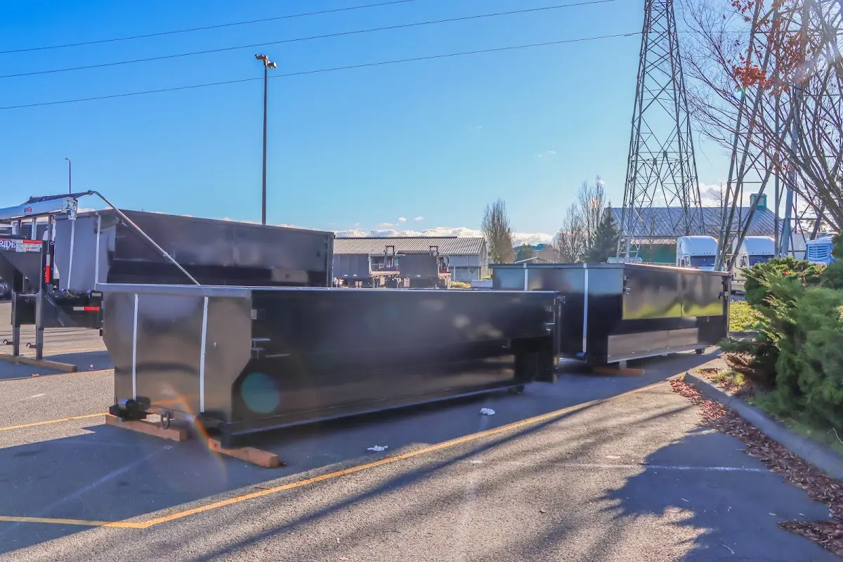 Roll-off dumpster ready for waste disposal at job site for 3 Yard Dumpster Rental in North Providence